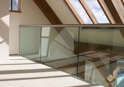 Frameless Glass Channel mounted on an internal balcony